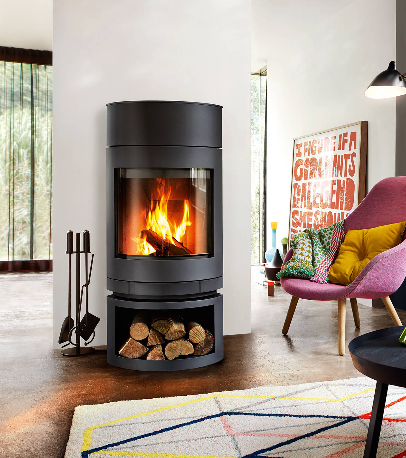 Emotion fireplace with open wood storage base and thermostone heat conservation module